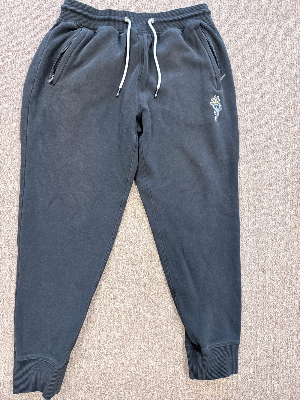 Men's Black Jogger Sweatpants with Embroidered Torch Accent